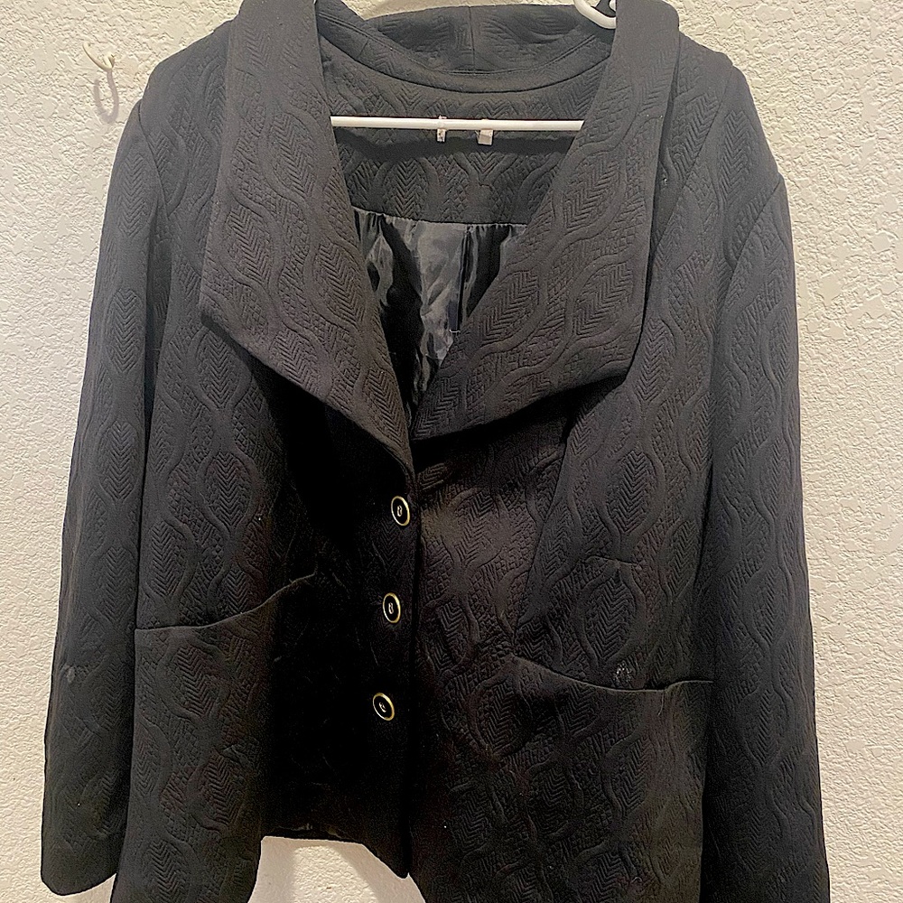 Black blazer 95% polyester 5% spandex fully lined from “The Avenue”.